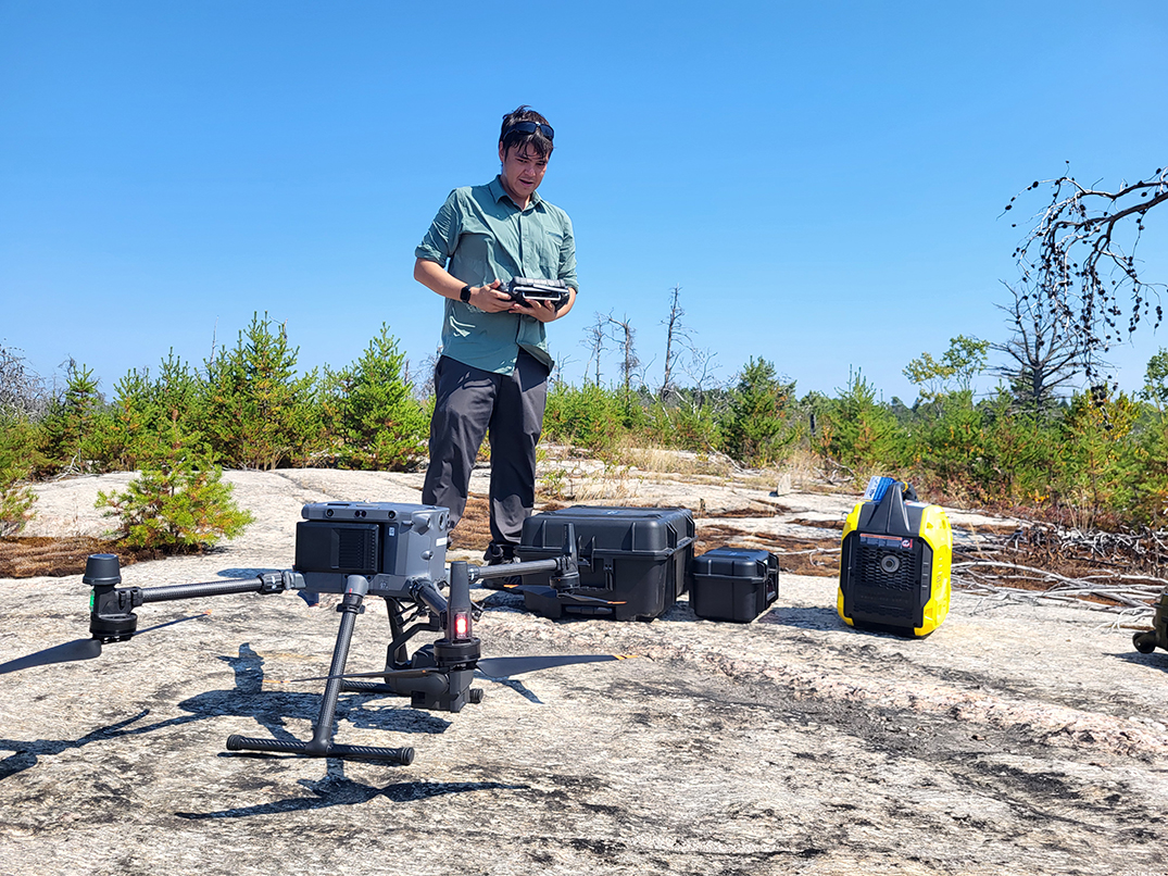 Pilot preparing to launch drone